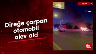 Konya'da direğe çarpan otomobil alev aldı