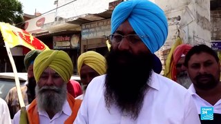 Agricultores indios que protestaron contra Narendra Modi, una población clave en los comicios