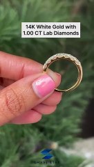 Half eternity band in 14K yellow gold crafted in lab grown diamonds.