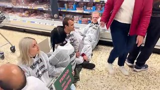 Animal rights activists stage protest in Tesco meat aisle