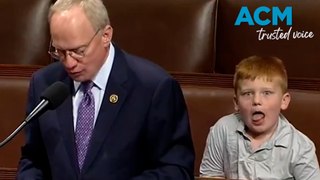 Congressman’s 6-year-old son makes faces during a live-cross