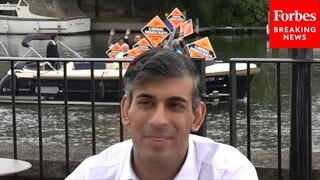 WATCH: UK Prime Minister Rishi Sunak Photobombed By Liberal Democrats During Campaign Event