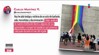 Líder sindical del Infonavit arrancó la bandera LGBT que estaba colgada en el edificio