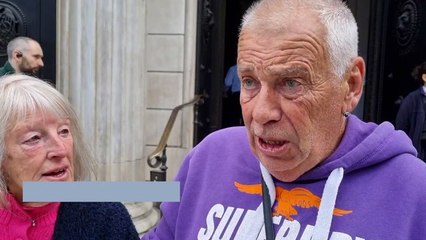 Royalists gather outside the Bank of England to collect new King Charles notes