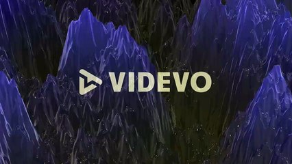 Blue abstract waves pattern with glitters on black gradient