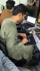 This boy very intelligent  working in car parking projects