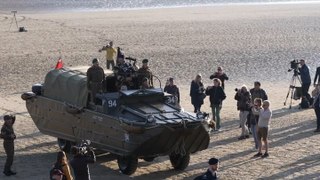 Lone piper plays on Gold Beach to mark exact moment British troops stormed Normandy 80 years ago