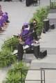 Man Trips and Falls Down Steps During Graduation Ceremony