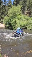 Man Falls With Motorcycle While He Tries to Cross River