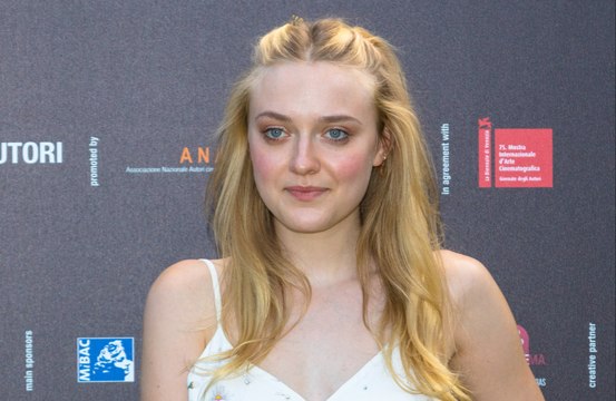 Dakota Fanning has received a new pair of shoes from Tom Cruise every year