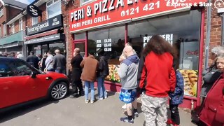 A huge queue for 1p chips at Merchants Fish and Chip shop, Halesowen.