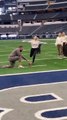 Woman Trying to Kick Football Fails Hilariously