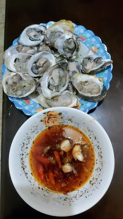 Talaba with vinegar, chili pepper. 