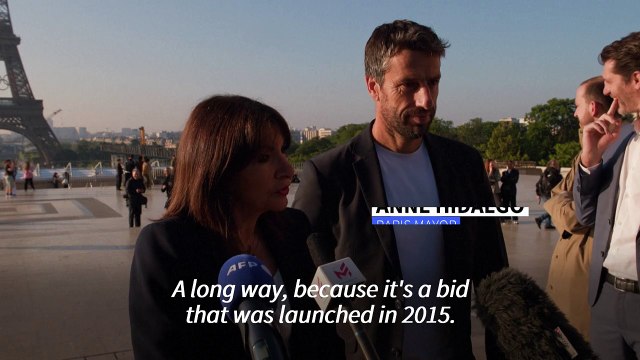 Olympic rings unveiled on Eiffel Tower for Paris 2024