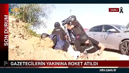 NTV muhabirinin Gazze sınırındaki zor anları. Gazetecilerin bulunduğu bölgeye roket düştü