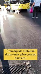 Otobüsün altına yatan vatandaşı tokatlayarak çıkardılar