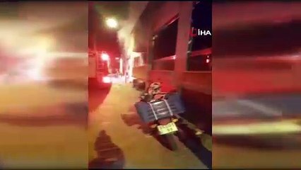 Evinde meydana gelen patlamadan korkup balkondan atladı