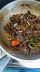 Beef  steak with chili and onion with soy