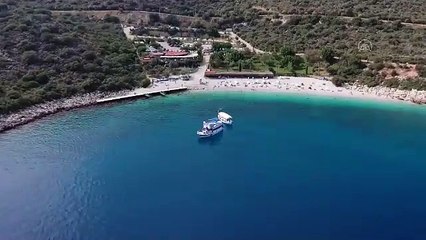 Turizm cenneti Kaş’ta denizden çıkan pes dedirtti: Kamyon lastiği, bar sandalyesi, tencere, şişe