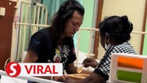 Heartwarming video of woman feeding hospital patient goes viral