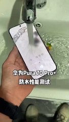 The boy washed his mobile in water to see if it was waterproof