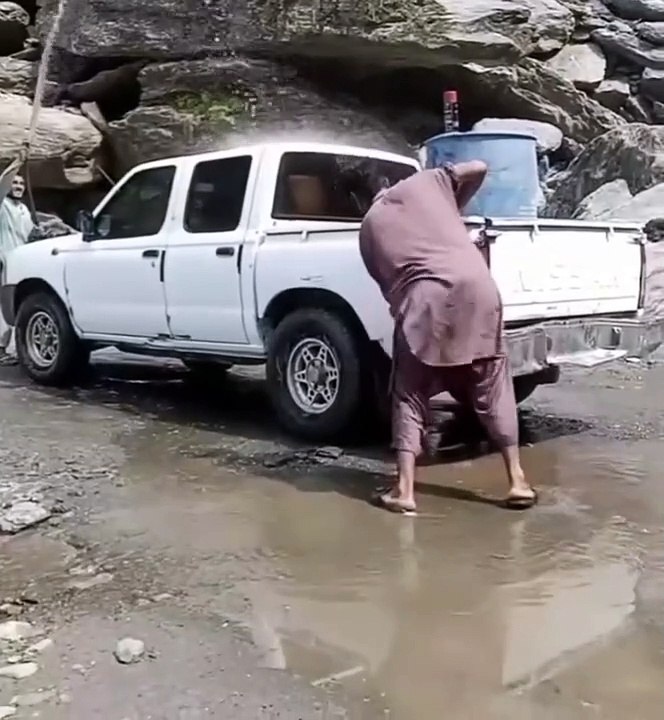 Back Bally Dancer during car washing