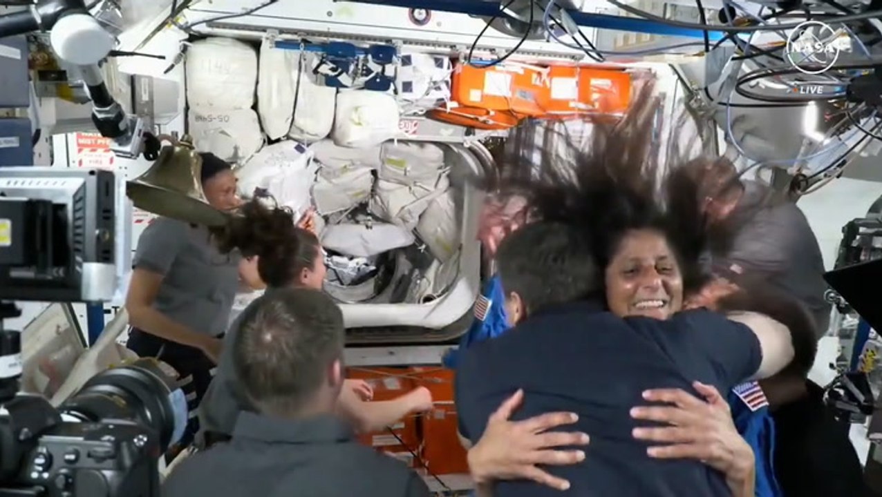 Delighted astronauts embrace after Boeing Starliner’s first crewed journey from Earth