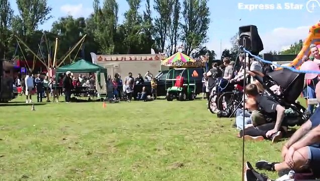 Stunt performer Jez Avery demonstrates his skills at Willenhall Carnival.