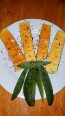 Do you eat half-ripe mangoes on the tree?