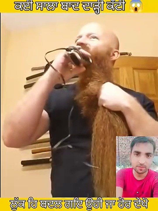 Men cut his beard a huge beard