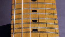 mixkit-wooden-neck-of-an-electric-guitar-2425-hd-ready