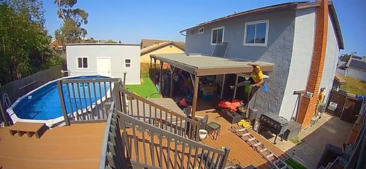 Man Falls From Top of Ladder