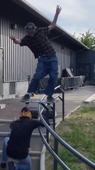 Guy on Skateboard Hits Friend's Head and Crashes While Attempting Handrail Stunt