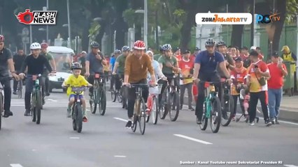 PRESIDEN JOKOWI AJAK IRIANA DAN JAN ETHES BERSEPEDA DI KAWASAN THAMRIN