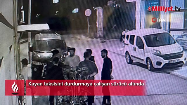 Kayan taksiyi durdurmaya çalıştı, altında kaldı