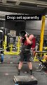 Man Lifting Heavy Dumbbell Watches Plates Slide and Fall Off