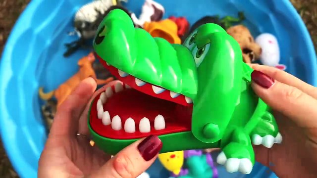 Learn the English names of animals using wild toys-sharks, elephants, lobsters, dinosaurs, giraffes