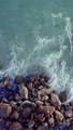 overhead-view-of-a-rocky-coast-and-waves-crashing-51502-hd-ready