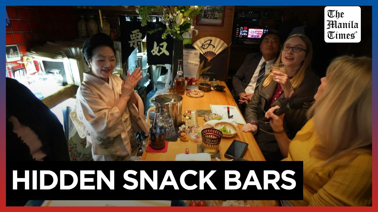 Tourists get taste of old Japan at hidden 'snack bars'