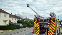 Firefighters at the scene of a house fire in Shetland Way, Corby