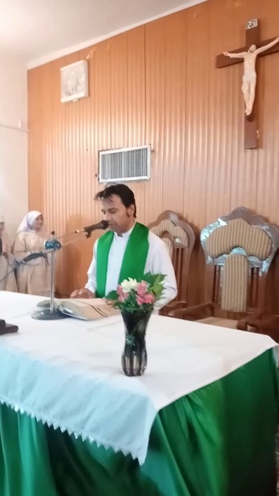 Reverend Father Kashif Jameel is celebrating Holy Mass at St. Peter's Catholic Church, Attock, Cantt, Pakistan