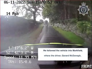 Land Rover driver reverse rams police car
