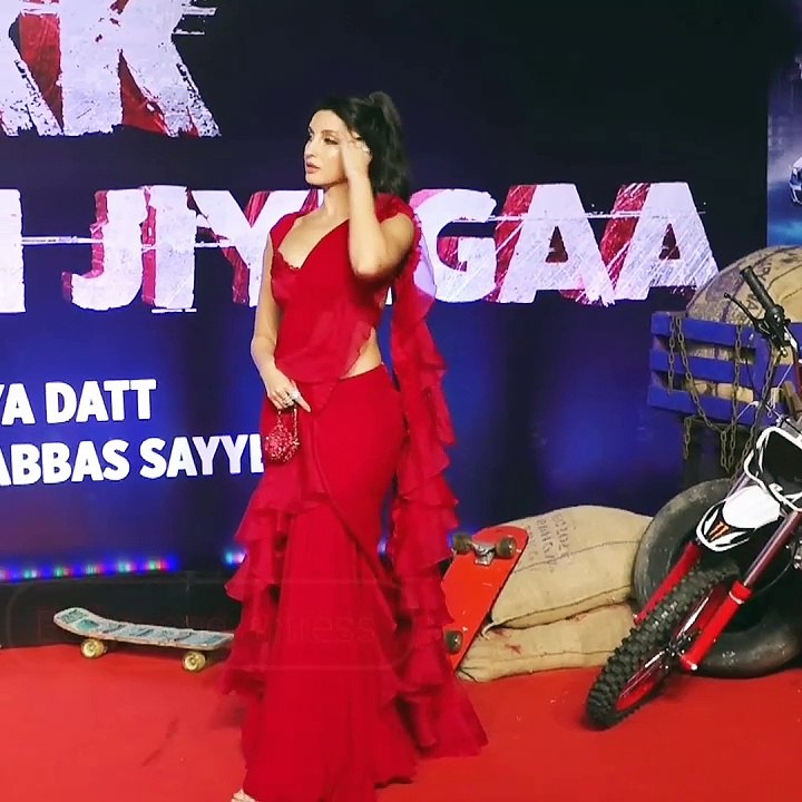 Nora Fatehi Shines in Stunning Red Ensemble. Best music video