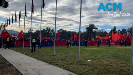 Protestors chant during Chinese Premier Li Qiang visit