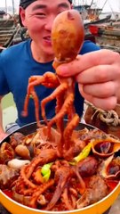 Chinese fisherman cooking and Eating fresh seafood...