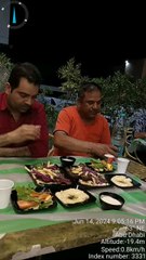 Delicious Night Feast: Savoring  Charcoal-Grilled Chicken"with friends