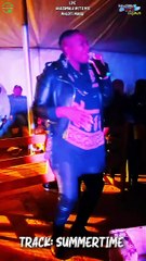 Mhloti Musiq along with Khazamula with a mic performing their single "SummerTime