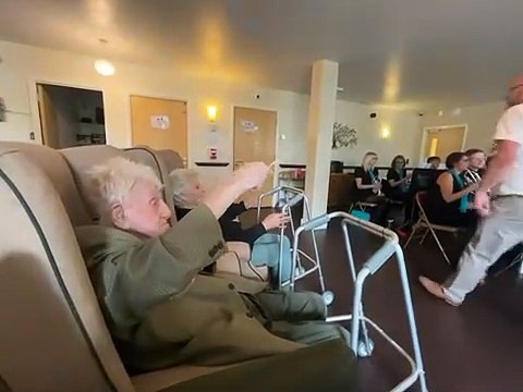 109-year-old D-Day veteran conducts brass band at care home concert