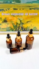 Wholesale Amber Essential Oil Dropper Bottle with Black Nip and gold aluminium neck