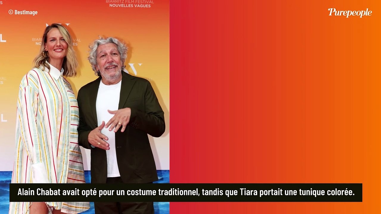 PHOTOS Alain Chabat charmé par Tiara en plein festival : en robe chemise colorée, son immense compagne en met plein la vue...